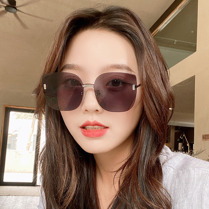 5824752.傲龙AORON 新款无框切边太阳镜女
