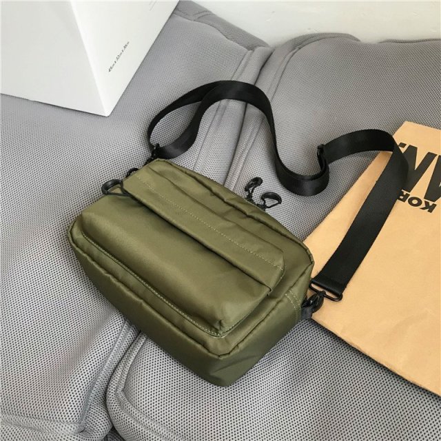 13673809.新款纯色简约包尼龙防水收纳包
