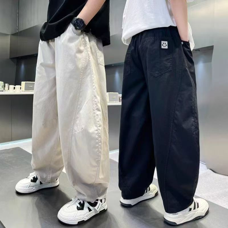 13445460.儿童春秋休闲运动裤男童中大童宽松百搭笑脸标工装裤男孩长裤
