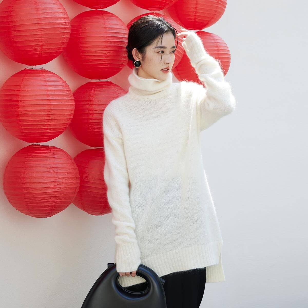 12549119.思诺芙德高领不对称长袖女士针织衫