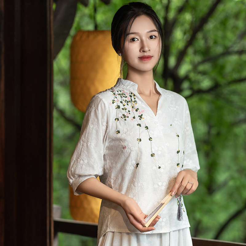 13459027.初云紫衣春夏装 女时尚文艺V领套头刺绣花前短后长五分袖衬衫4788