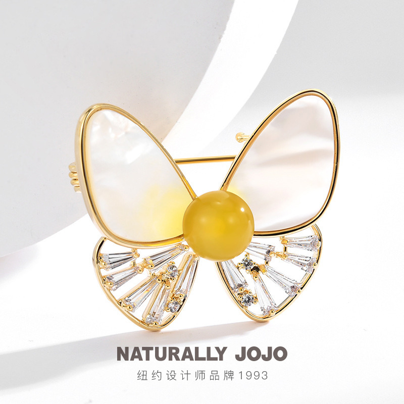 10976491.NATURALLY JOJO 奢华气质母贝仿蜜蜡蝴蝶大气胸针