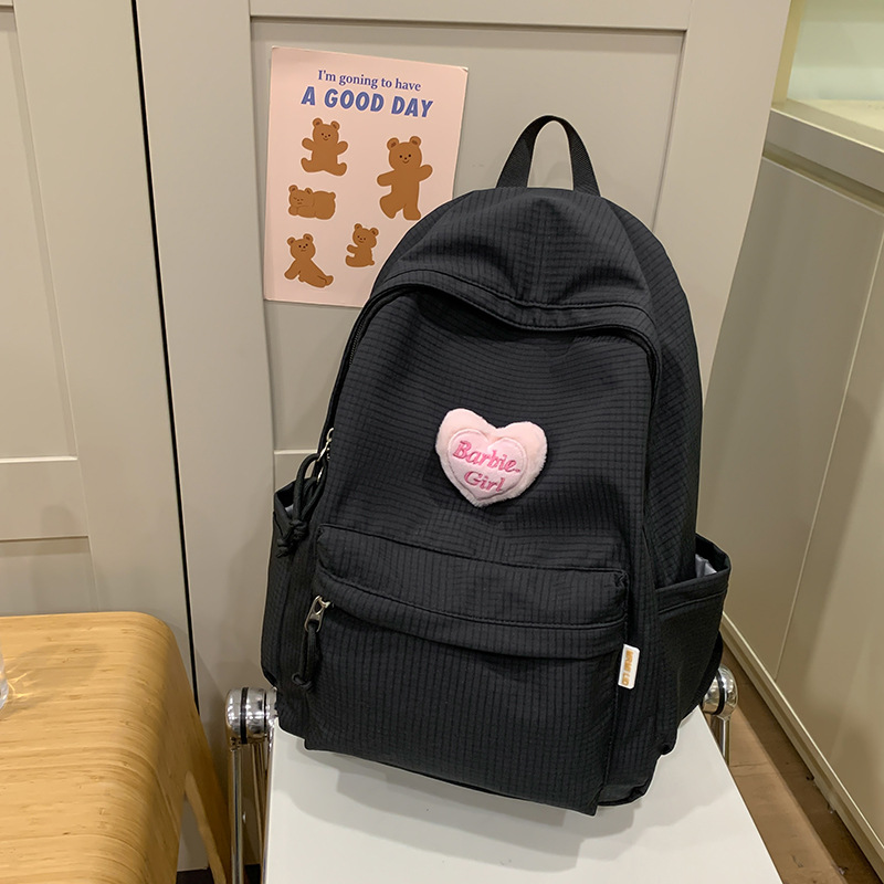 11858178.百搭书包中学生双肩背包女简约少女心大容量背包格子纹双肩包