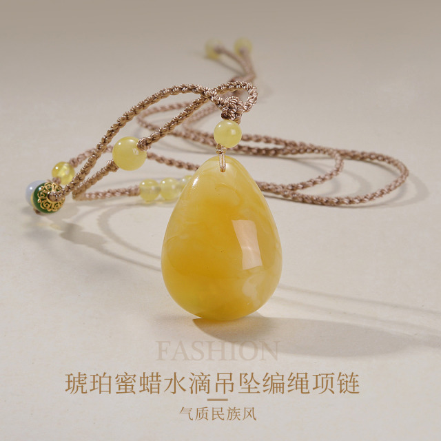 13288323.佰色传情琥珀蜜蜡水滴吊坠编制绳复古气质民族风项链毛衣链