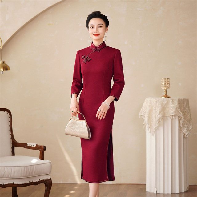 13269064.高档金丝羊毛呢旗袍秋冬2026新款七分袖中国风喜婆婆喜妈妈连衣裙