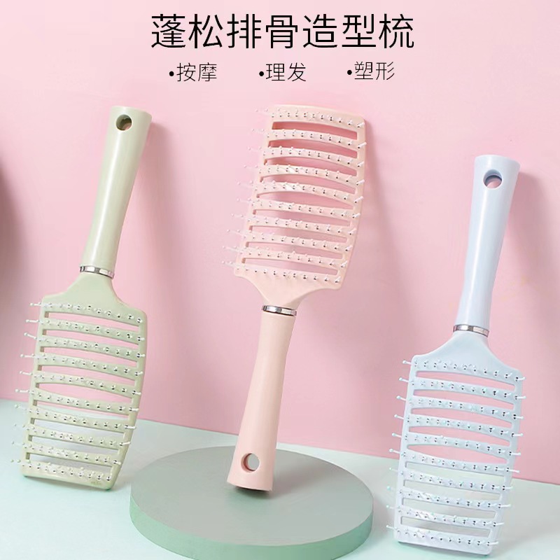 13363906.马卡龙气垫梳立式长柄家用学生按摩梳子大弯气囊梳排骨梳蓬松卷发