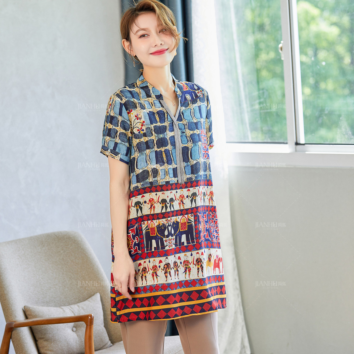 13727314.中年女夏装时尚拼接中长款短袖T恤中老年妈妈夏季洋气薄款上衣