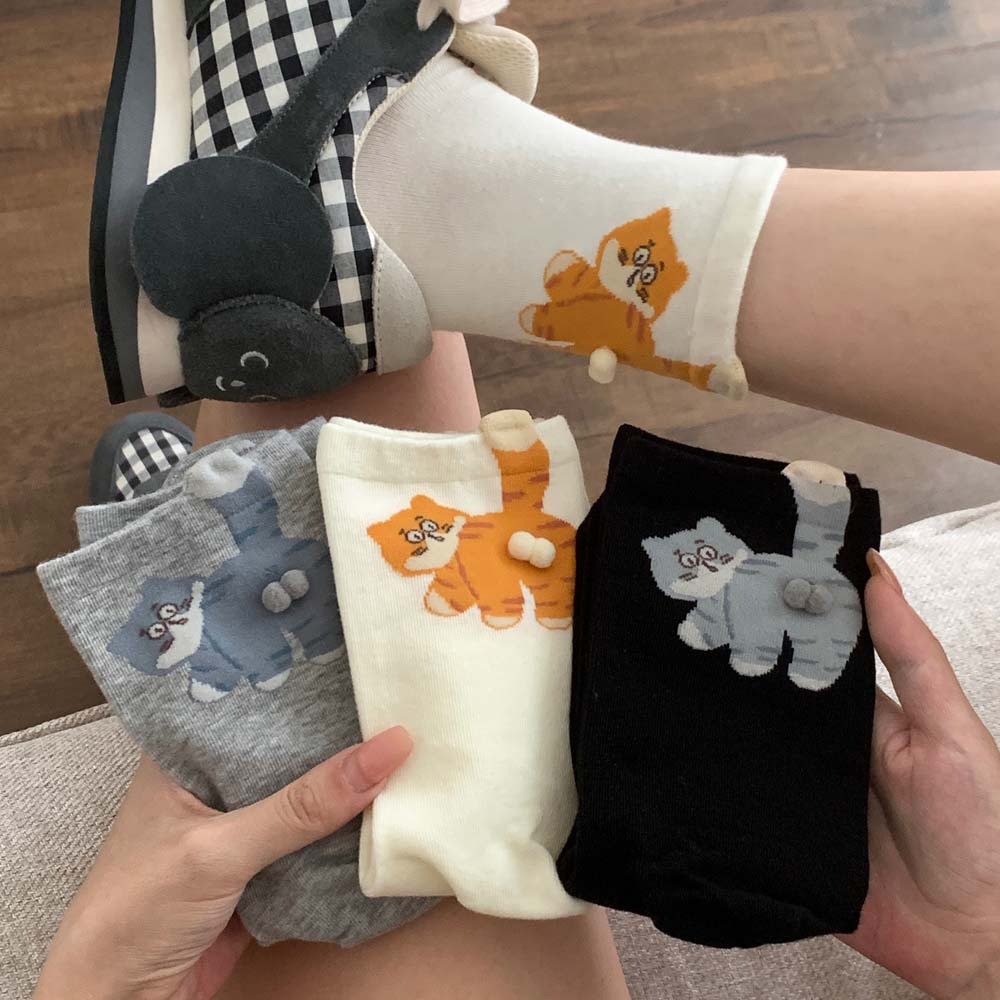 12822513.捣蛋猫秋季新款女士中筒袜可爱猫咪立体蛋蛋毛球中筒袜