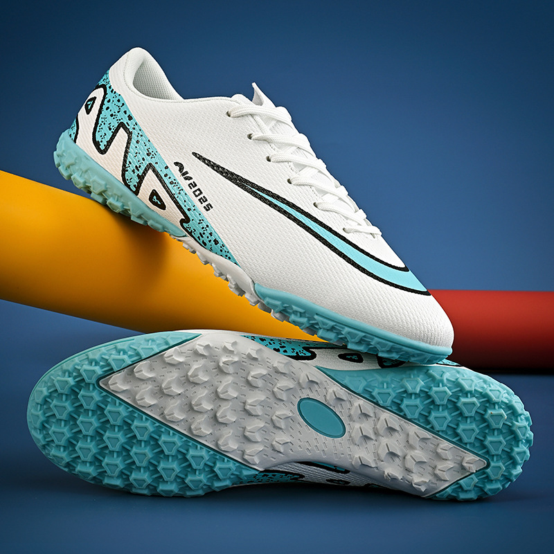 12895360.意达鸟春秋款足球鞋男女青少年儿童学AG长钉TF碎钉训练鞋