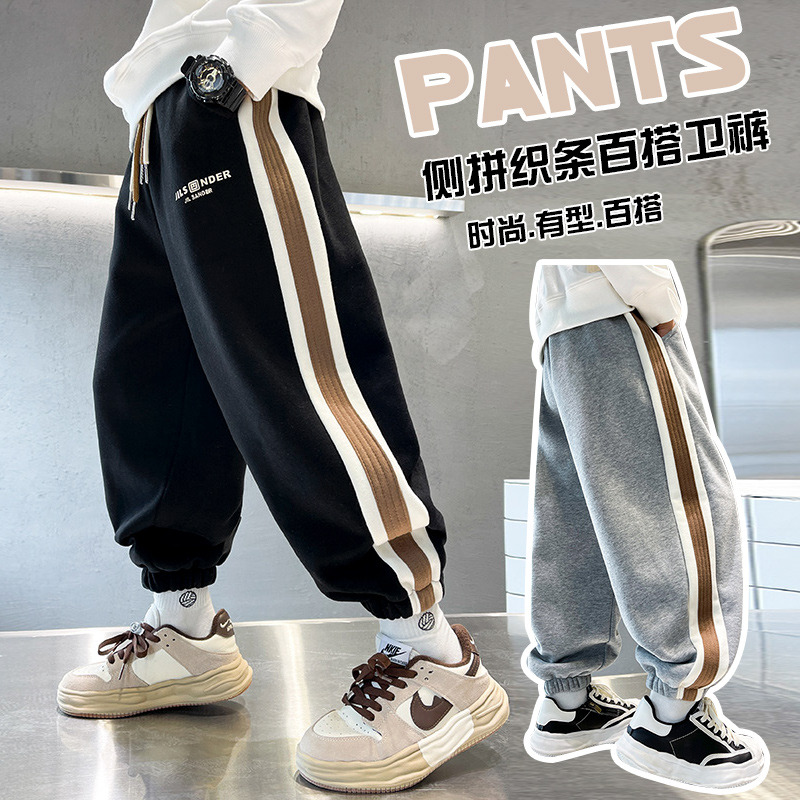 13817381.汤姆牛男童春秋款测拼织条百搭卫裤运动裤