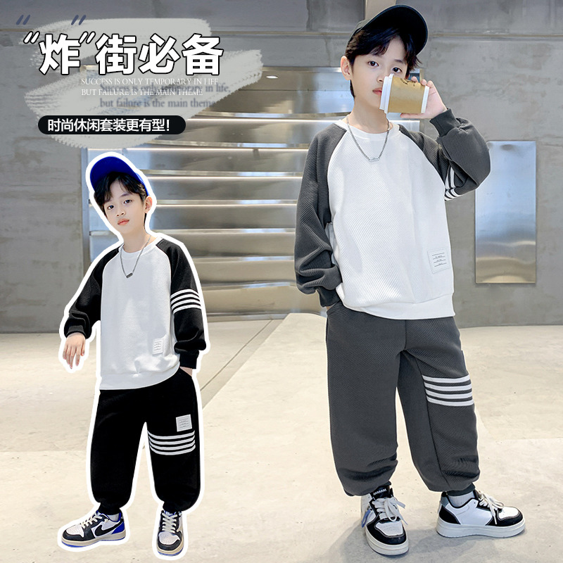 13826147.汤姆牛男童春秋款中大童时尚休闲拼接套装