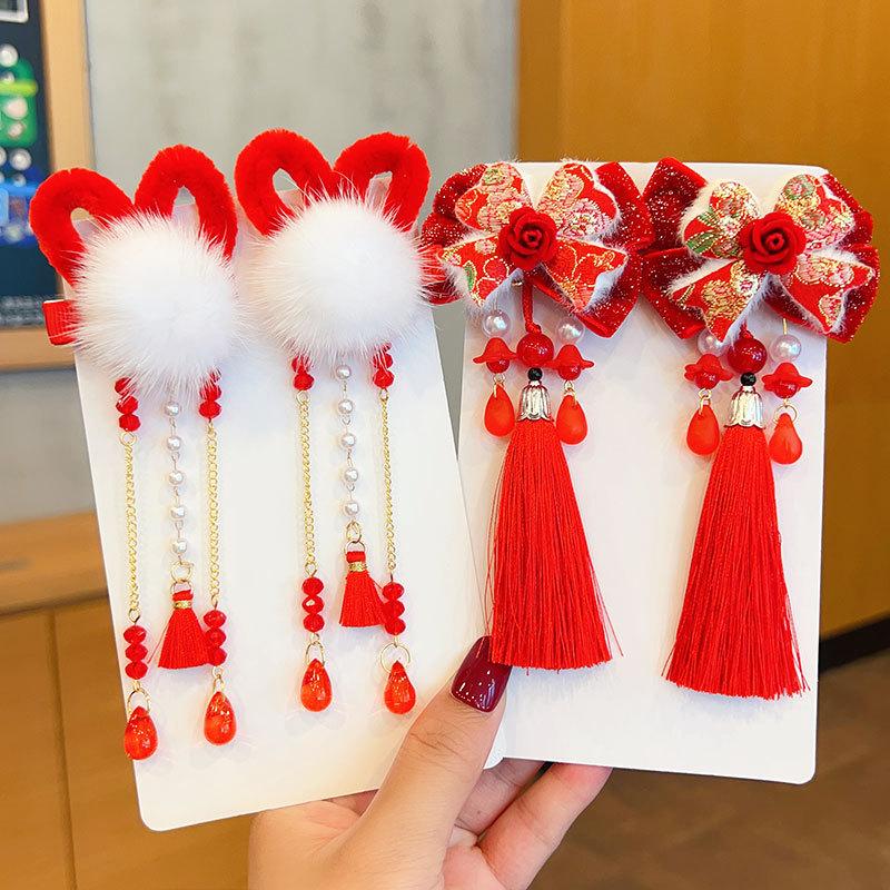 13266344.儿童新年发夹蝴蝶结假发辫女童古风头饰宝宝拜年流苏毛球汉服发饰