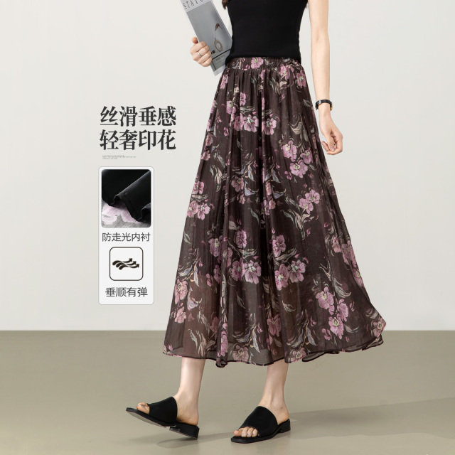 13599553.【左街右巷】轻盈飘逸晕染印花中长款半身裙