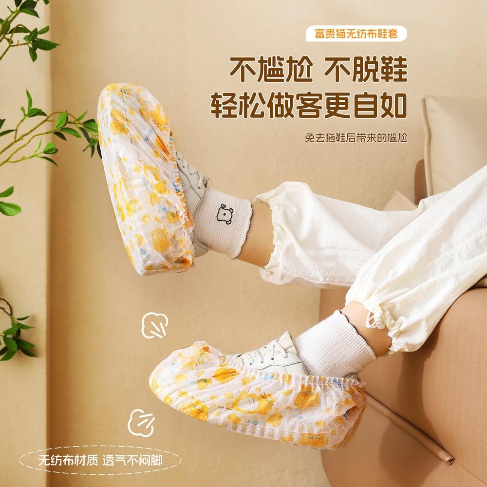 13219609.防滑耐磨待客塑料脚套一次性鞋套室内家用加厚成人无纺布防水
