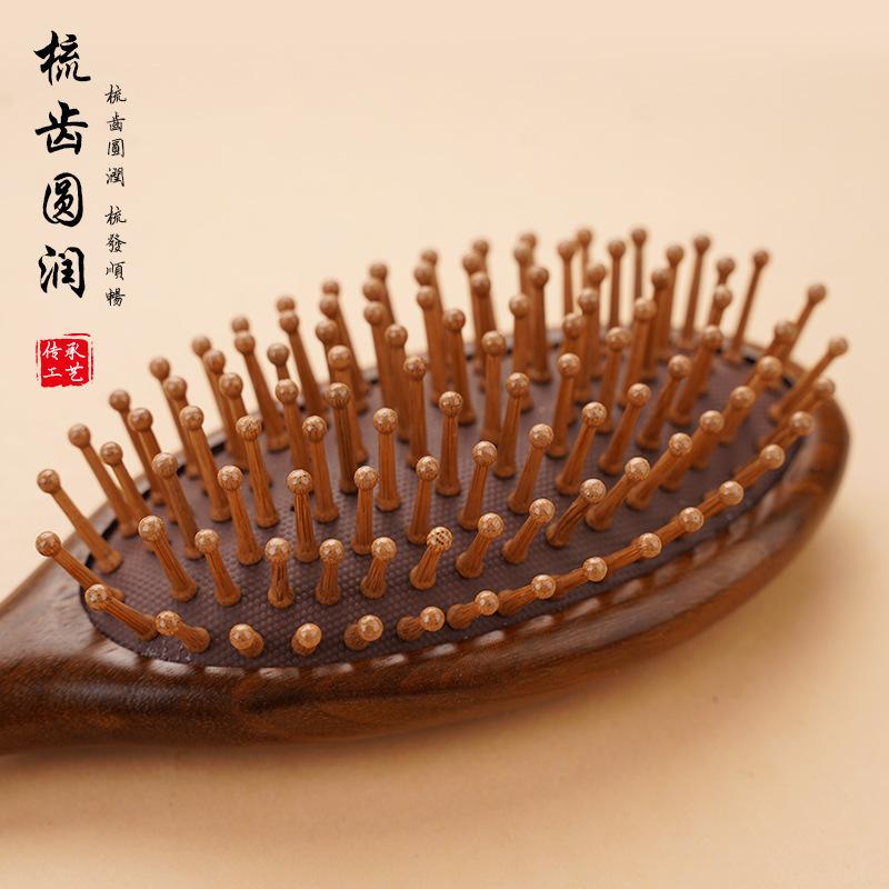 13451909.金丝檀木气囊梳气垫梳子礼盒装梳子按摩梳女士卷发
