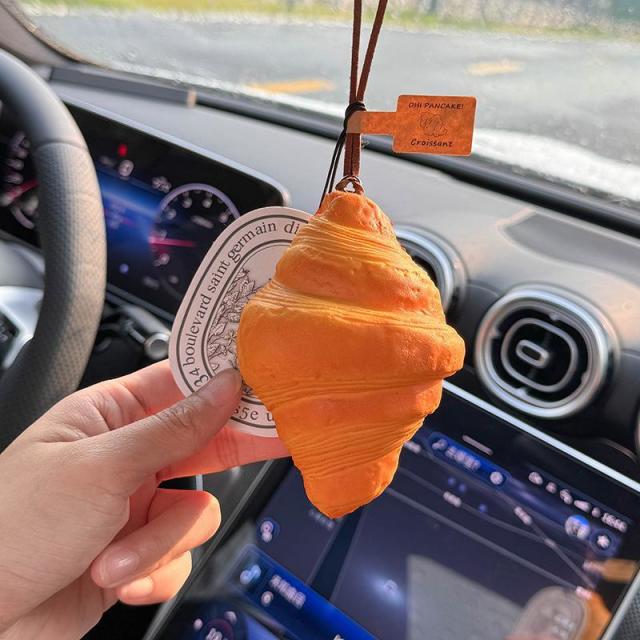 13457047.创意车挂汽车挂件贝果牛油果后视镜挂饰车载装饰车内饰品