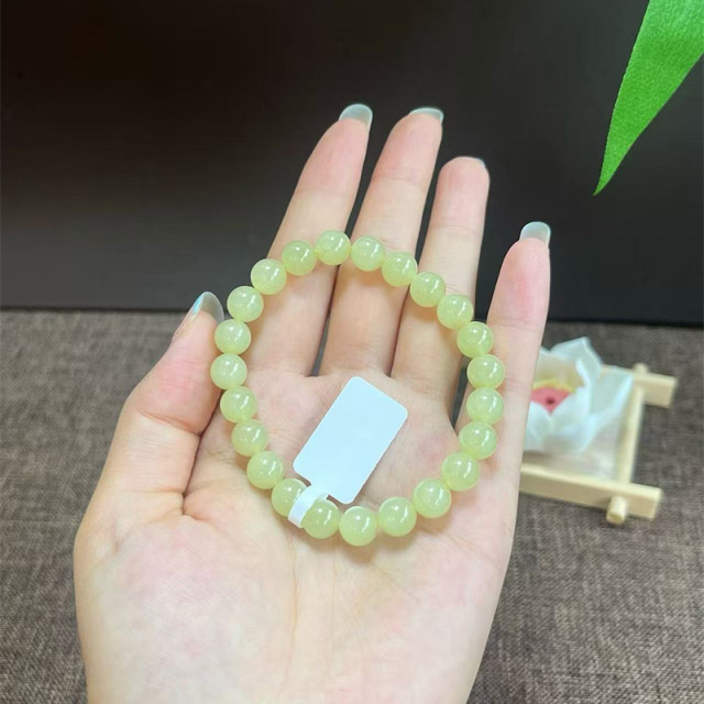 13779473.晶屿新疆天然和田玉青黄口手串
