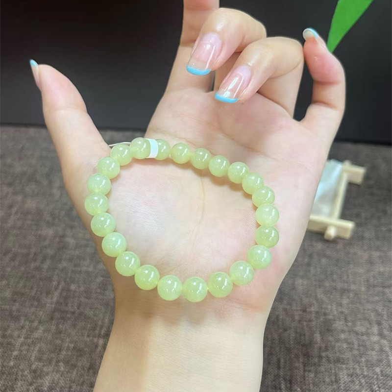 13779473.晶屿新疆天然和田玉青黄口手串