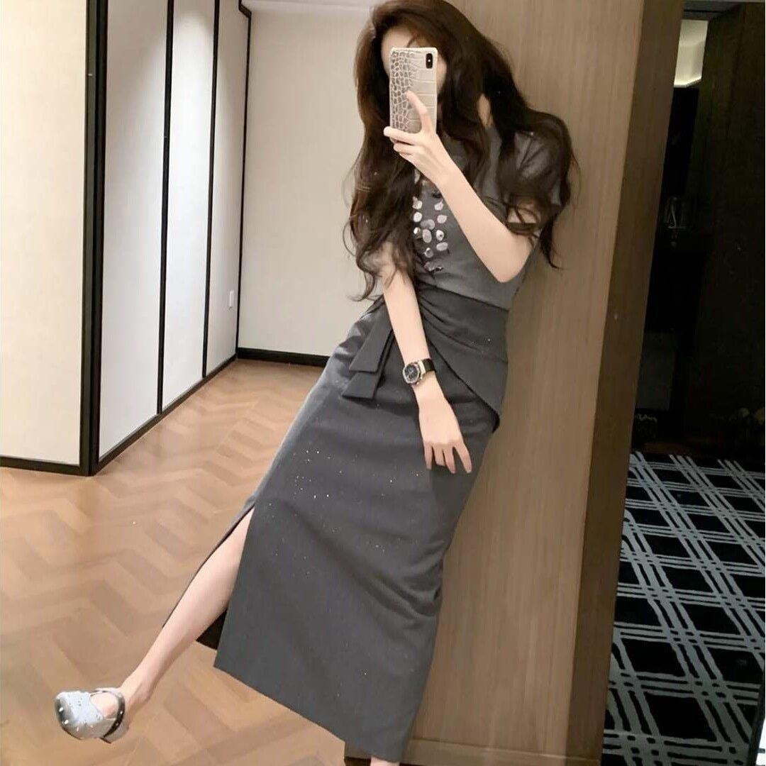 13762351.诗茉琳2026新款韩系设计感修身显瘦蕾丝上衣高腰气质碎花半身裙套装