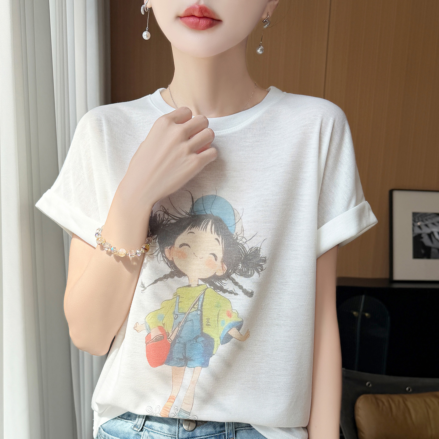 13739923.绒暖享精仿系列减龄女孩卡通印花圆领短袖针织上衣宽松打底衫