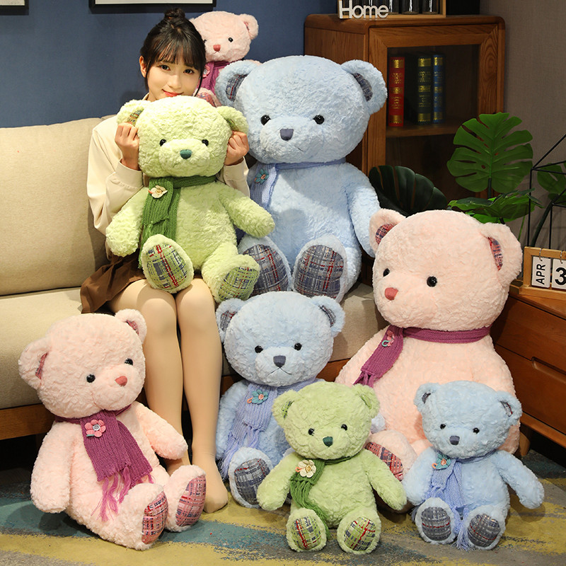 12656576.丽优哲品牌毛绒玩具新款可爱七彩熊公仔泰迪熊玩偶女生抱抱熊床上玩具送女生