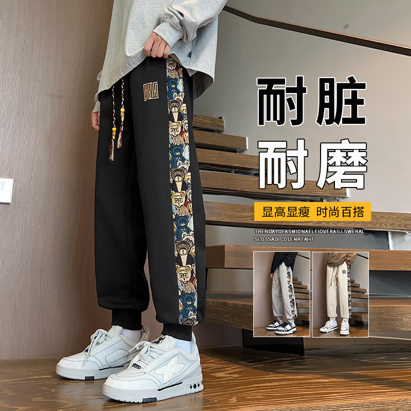 11112659.尼格卡丹 高街卫裤男士春秋季宽松束脚潮牌刺绣侧边条纹休闲长裤子