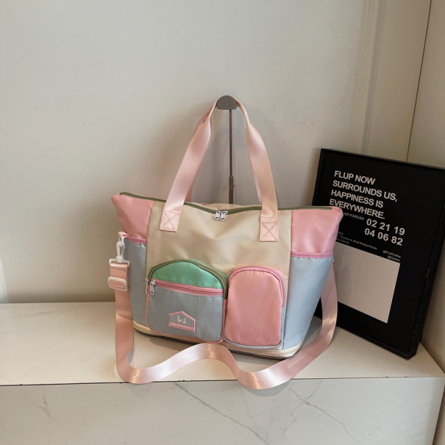 12586017.撞色休闲运动健身包女大容量手提斜挎行李包轻便短途出差旅行包男