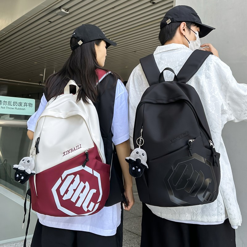 10896912.EH潮流字母印花耐脏洋气双肩背包情侣款男女通用耐用学生书包大容量
