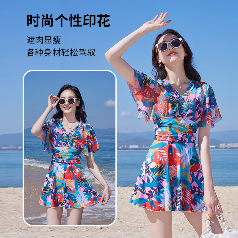10451954.巴洛尼莫夏季新款成人女士泳衣时尚个性印花涂鸦连体式保守遮肚显瘦游泳裙YY8900