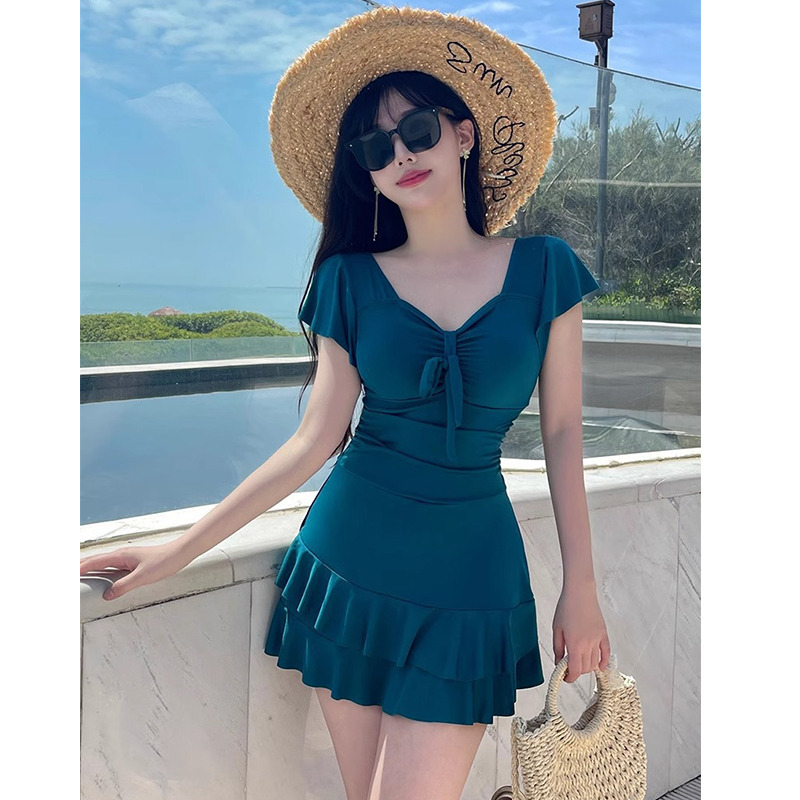 13603957.巴洛尼莫连体泳衣女士遮肚显瘦保守带胸垫海边度假温泉连衣裙式泳装YY0295
