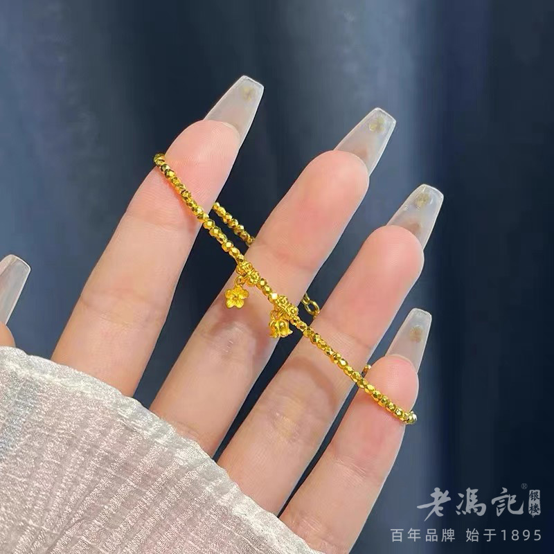 13271849.碎金几两黄金色爆闪铃兰花手链轻奢小众女生精致