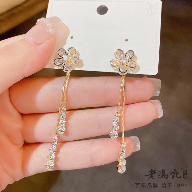 11120982.东大门新款一款两戴花朵长款流苏耳坠S925银针精致高端品质