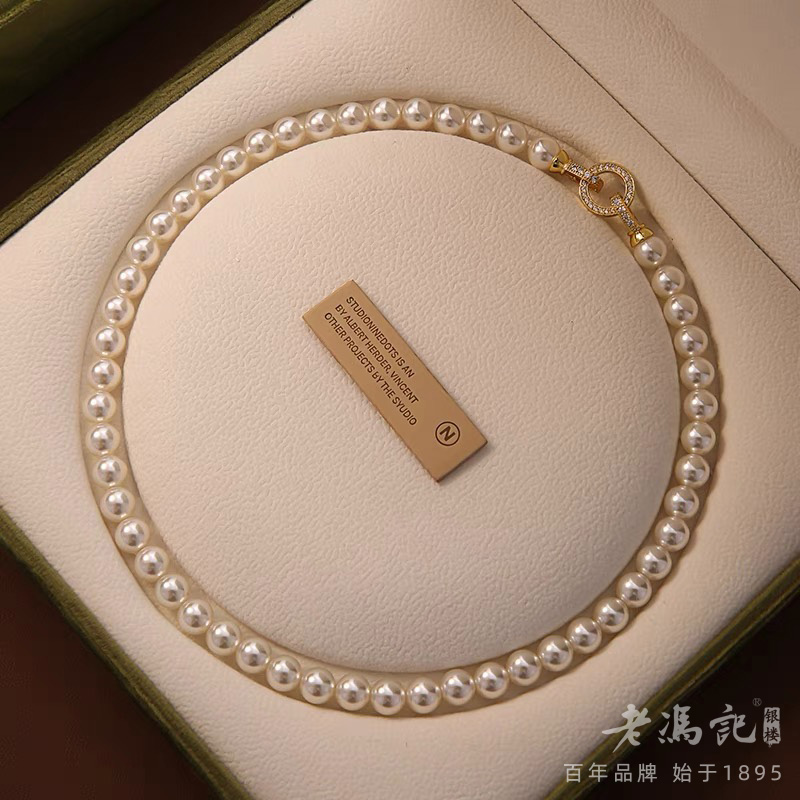 11121030.倪妮同款强光施家水晶珍珠满钻扣头高品质锁骨链