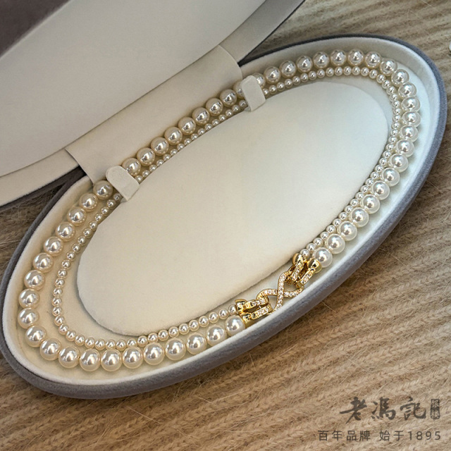 11243429.(超级福利)新品双层叠戴施家水晶珍珠正圆强光