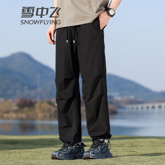 13138605.雪中飞男女同款休闲长裤春季新款情侣款可收脚工装裤