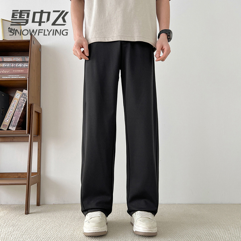 13138664.雪中飞男士休闲裤