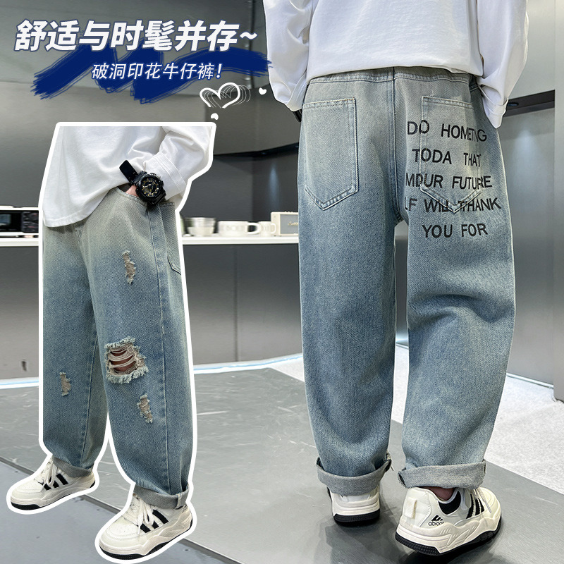 12938974.男童春秋款破洞潮流英文印花牛仔裤