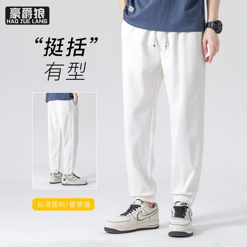 12211710.休闲运动卫裤男士春夏新款百搭束脚莱赛尔透气松紧长裤子