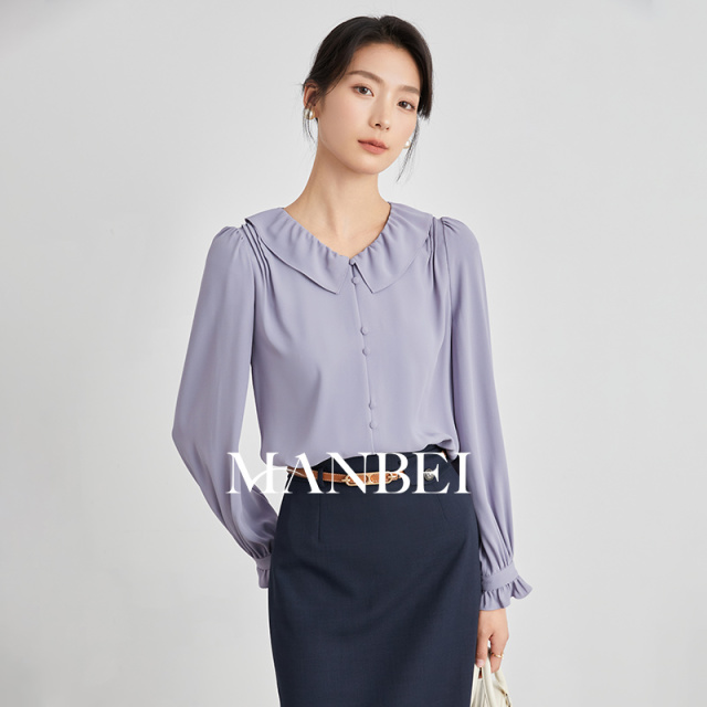 12556052.曼贝夏季新款温柔碎褶木耳边女式衬衫