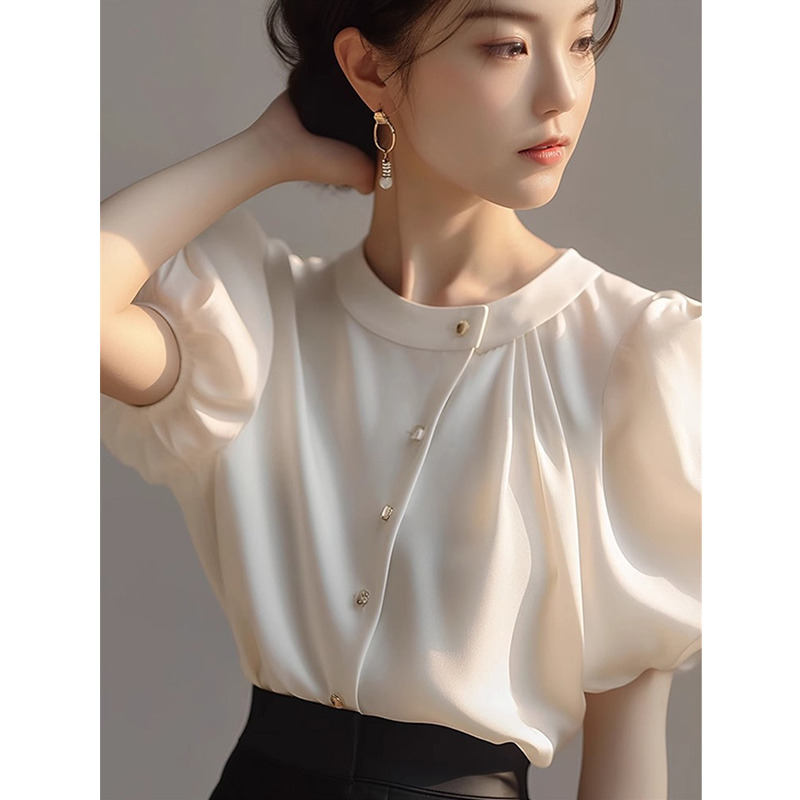 13288216.丹芙娅夏季新款法式气质名媛简约通勤显瘦白色圆领泡泡袖衬衫女