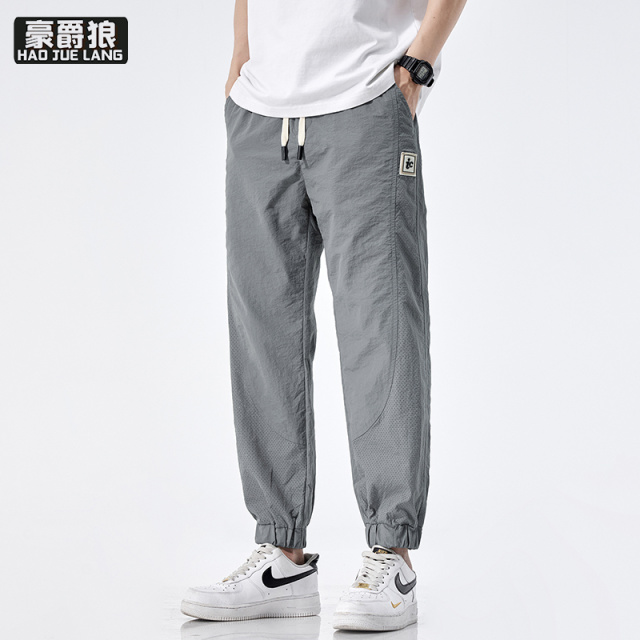 13340751.新款夏季薄款束脚休闲时尚百搭男装裤子透气裤子男冰丝休闲裤