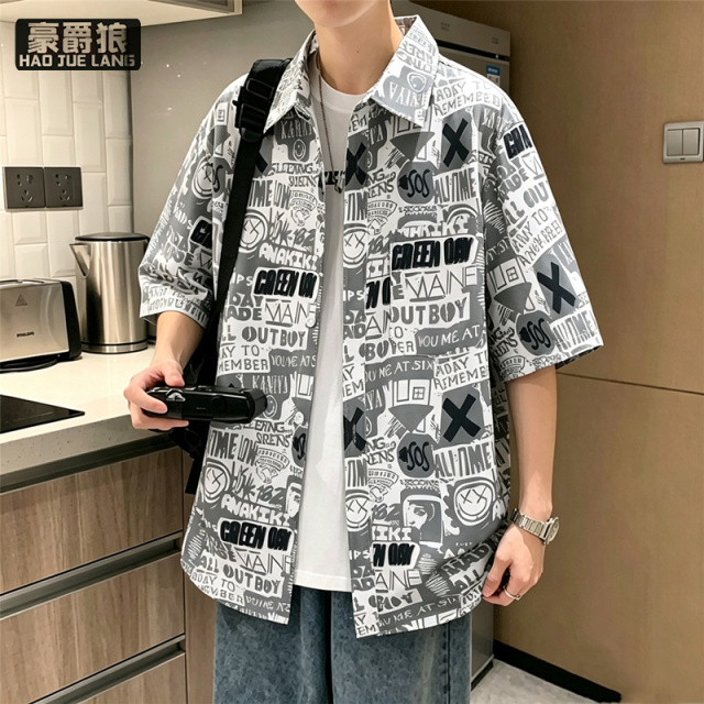 13502781.夏季青少年港风潮流印花短袖衬衫男初中学生度假休闲宽松薄款衬衣