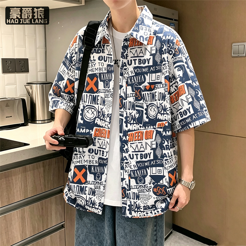 13502781.夏季青少年港风潮流印花短袖衬衫男初中学生度假休闲宽松薄款衬衣