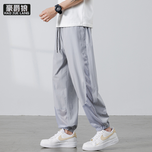 13519013.冰丝网眼休闲裤子男士夏季薄款宽松大码夏天透气速干运动裤