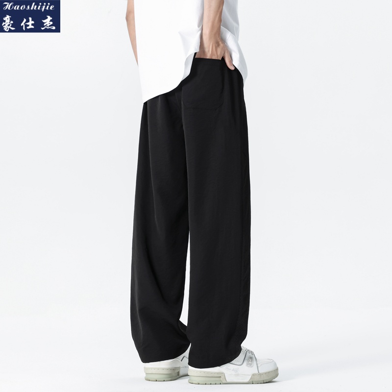 13537457.《休闲简约》夏季爆款个性透气孔时尚潮流简约男宽松休闲裤