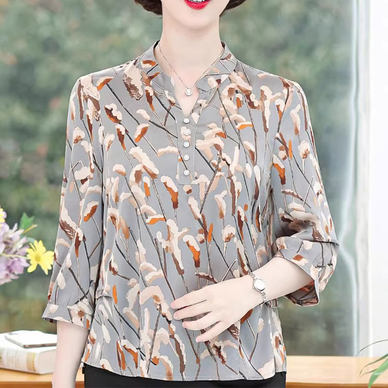 13539591.妈妈装时尚V领花色T恤小衫上衣