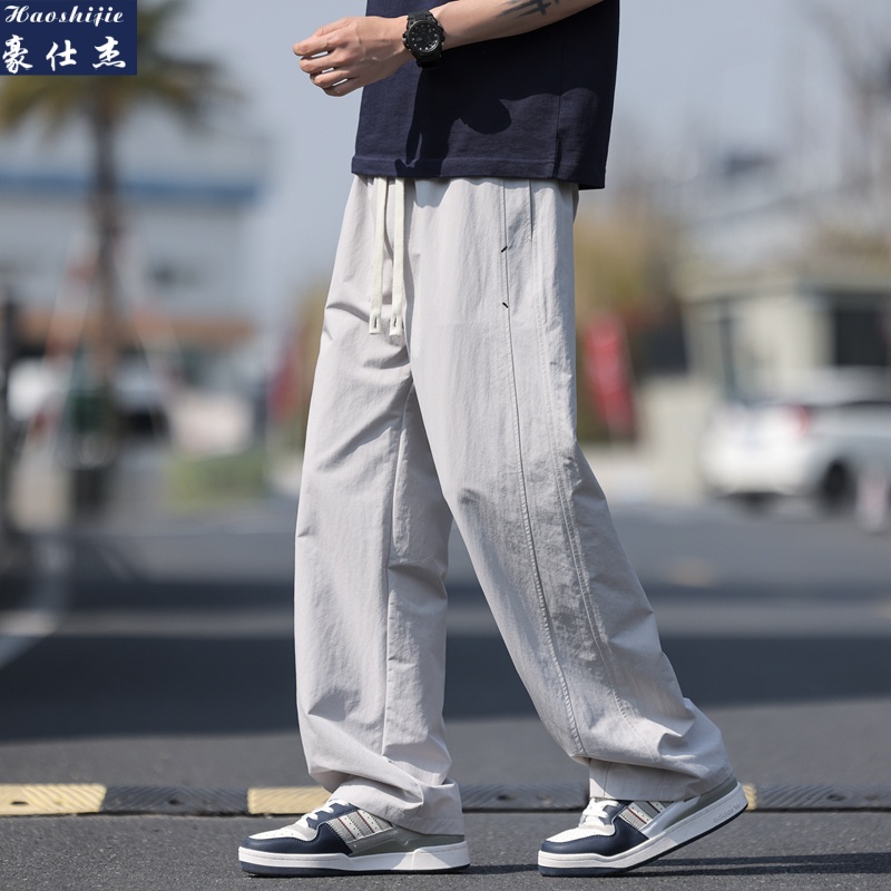 13589062.《休闲时尚》夏季新款百搭舒适透气冰丝裤休闲宽松潮流男裤