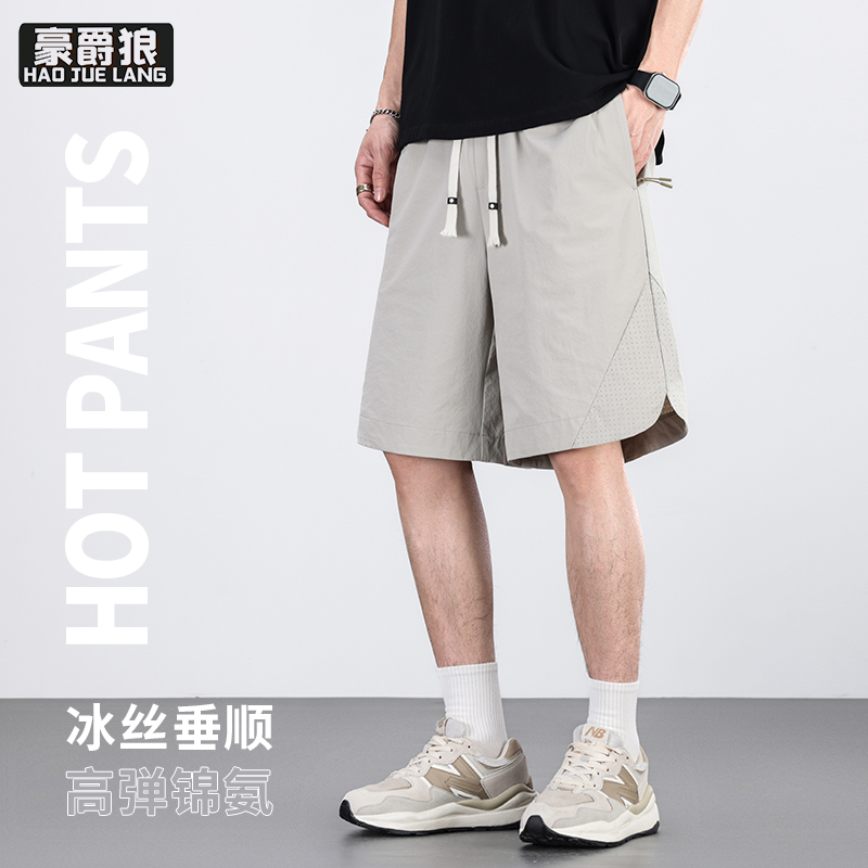13633510.冰凉亲肤夏季薄款透气宽松短裤时尚青年男士简约松紧腰五分裤