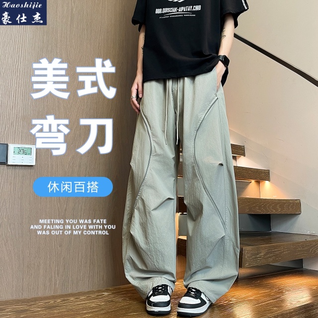 13670839.《休闲简约》夏季新款潮流舒适冰感弯刀裤青少年百搭裤子