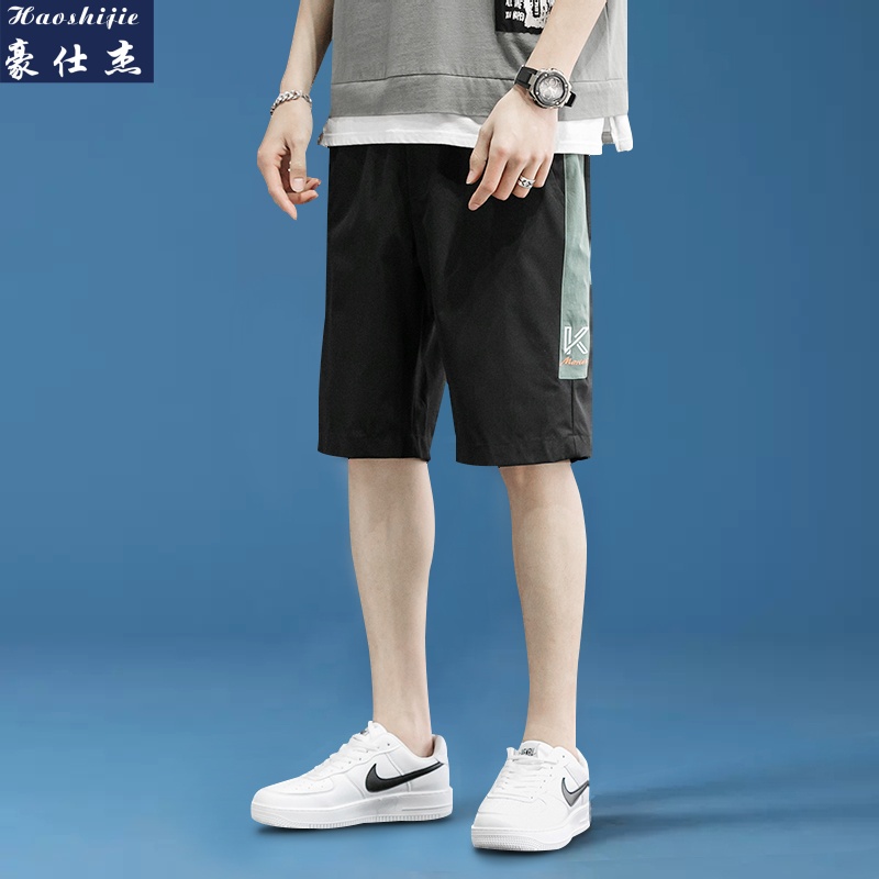 13685693.《休闲百搭》夏季爆款时尚小刺绣宽松简约男款户外运动短裤